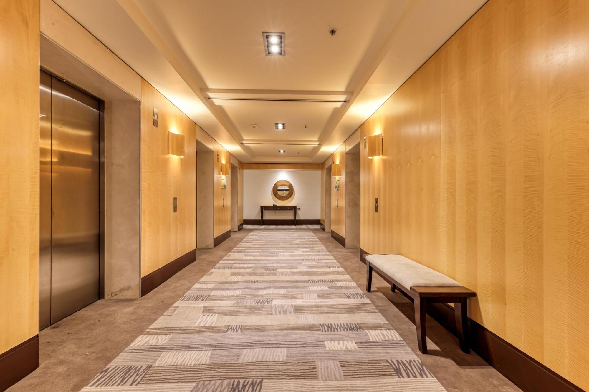 โรงแรมอโมร่า แจมิสัน ซิดนีย์ ภายนอก รูปภาพ The elevator lobby